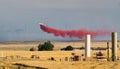 Firefighter Airplane Dropping Red Slurry Over Colorado Wildfire 2020 Royalty Free Stock Photo