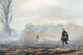 Firefighter battle with the wildfire. Firefighters are training. Firemen are using foam or water in fire fighting operation