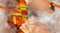 Firefighter battling blaze orange uniform axes Royalty Free Stock Photo