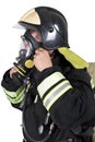 Firefighter corrects overview mask breathing apparatus Royalty Free Stock Photo