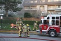 Firefighter crews battling apartment complex fire Royalty Free Stock Photo