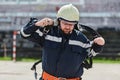 A firefighter dons the essential components of their professional gear, embodying resilience, commitment, and readiness Royalty Free Stock Photo