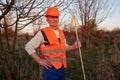 Firefighter ecologist working in field with wildfire. Royalty Free Stock Photo