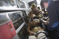 Firefighter And EMT Doctor Helping An Injured Woman Royalty Free Stock Photo