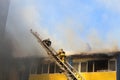 Blurred photo, two firefighters rescuers climb the stairs to the fire Royalty Free Stock Photo