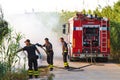 Firefighter extinguishing fire in Sicily