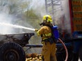 Firefighter Extinguishing the Fire