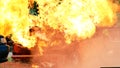 Firefighter fighting with flame using fire hose chemical water foam spray engine. Fireman wear hard hat, body safe suit uniform Royalty Free Stock Photo