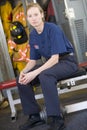 Firefighter in the fire station locker room Royalty Free Stock Photo