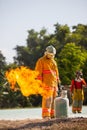 Firefighter with fire and suit for protect fire fighter for training firefighters. Royalty Free Stock Photo