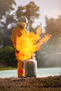 Firefighter with fire and suit for protect fire fighter for training firefighters Royalty Free Stock Photo