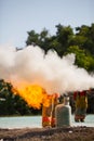 Firefighter with fire and suit for protect fire fighter. Royalty Free Stock Photo