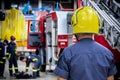 Firefighter, fireman. Emergency safety. Protection, rescue from danger. Fire fighter in protective helmet. Adult man, hero in Royalty Free Stock Photo