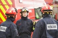 A firefighter giving instructions to her team