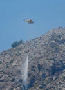 Firefighter helicopter working on wildfires area in Mallorca vertical