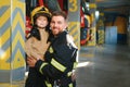 Firefighter holding child boy to save him in fire and smoke,Firemen rescue the boys from fire