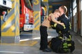 Firefighter holding child boy to save him in fire and smoke,Firemen rescue the boys from fire Royalty Free Stock Photo