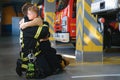 Firefighter holding child boy to save him in fire and smoke,Firemen rescue the boys from fire Royalty Free Stock Photo