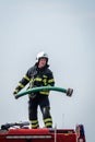 Firefighter holding a hose