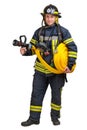 firefighter holds fire hose with fire nozzle in hands and looking at camera Royalty Free Stock Photo