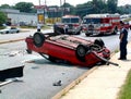 Firefighter investigating a auto accident Royalty Free Stock Photo