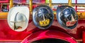 Firefighter lieutenant and captain helmets hanging on a fire truck