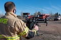 Firefighter operating drone in search and rescue