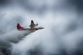 Firefighter plane dropping water