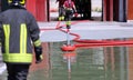 Firefighter positions a powerful fire hydrant during the exercises
