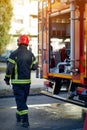 Firefighter in protective clothing, helmets and mask. Fireman in fire fighting operation