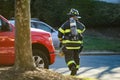 Firefighter at work with protective gear at day