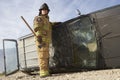 Firefighter Standing By Crashed Car