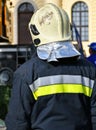 Firefighter stands on the city street