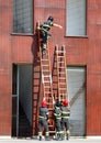 firefighter  with a wooden ladder during an exercise in the fire Royalty Free Stock Photo