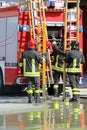 Firefighters in action take the ladder Royalty Free Stock Photo