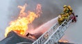 Firefighters battle blazing house fire Royalty Free Stock Photo