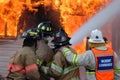 Firefighters battle a house fire