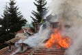 Firefighters burning house