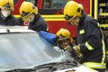 Firefighters at a car crash Royalty Free Stock Photo