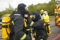 Firefighters check breathing apparatus