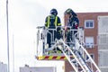 Firefighters climb a scale of a truck in one of the trainings in the fire station, in Madrid, Spain. Europe.