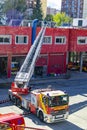 Firefighters climb a scale of a truck in one of the trainings in the fire station, in Madrid, Spain. Europe.