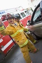 Firefighters cutting open a car Royalty Free Stock Photo