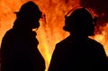 Firefighters on duty at wildfire wild forest fire out of control in night Royalty Free Stock Photo