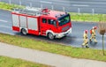 . Fire engine driving down street Royalty Free Stock Photo