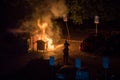 Firefighters Extinguish Burning Plastic Dumpster