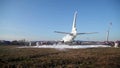 Firefighters extinguish the fire in the airport