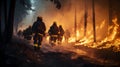 Firefighters on duty at wildfire wild forest fire out of control in night Royalty Free Stock Photo