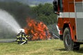 Firefighters extinguish fire Royalty Free Stock Photo