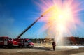 Firefighters extinguish the sun with foam and water.